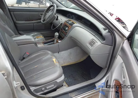 2001 Toyota Avalon Xls z USA, uszkodzony, nr VIN 4T1BF28B41U159022